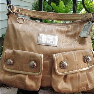 LN Gold Coach Poppy Bag Ret.$300